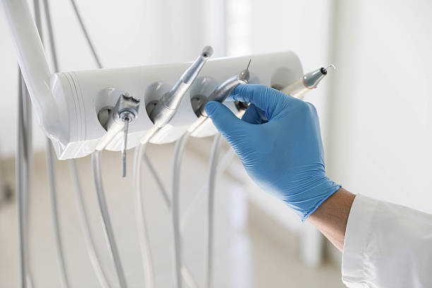 Professional Tooth Extraction technician working in Walnut Creek, NC